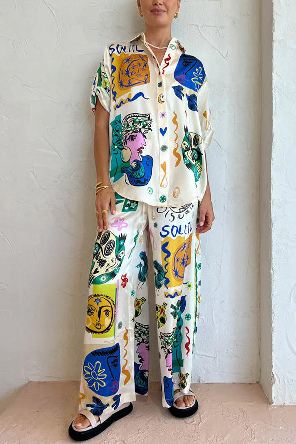 Pantalon large à taille élastique et poches Meralda à imprimé unique