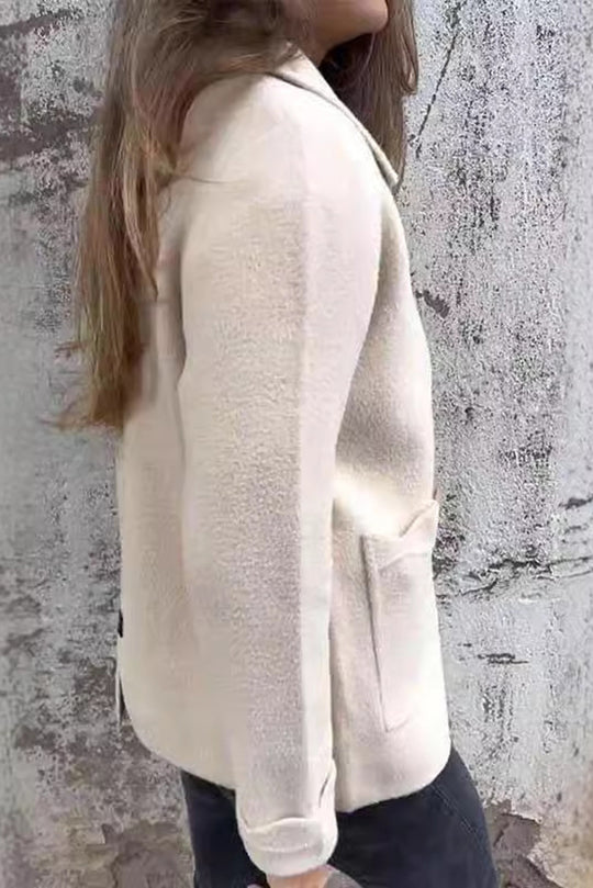 Veste décontractée à revers et poche zippée de couleur unie