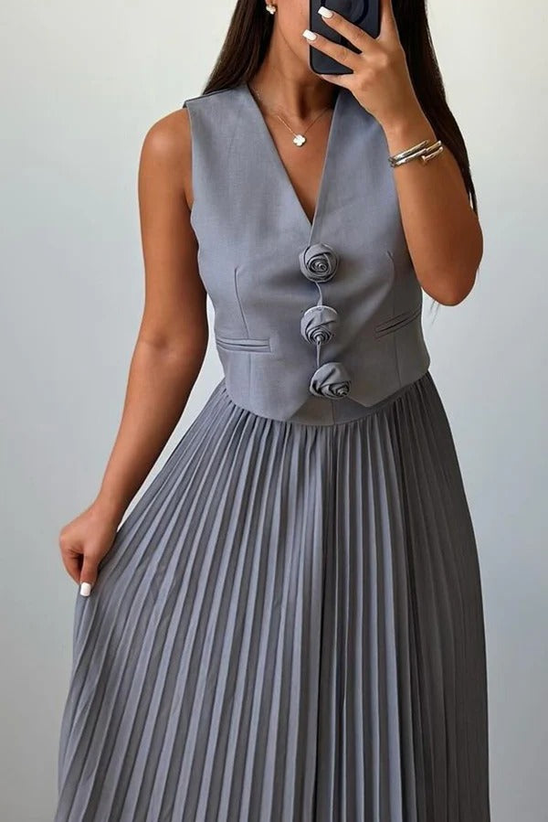 Stilvolles Set aus ärmellosem Tanktop und plissiertem Maxirock mit Rosette-Muster