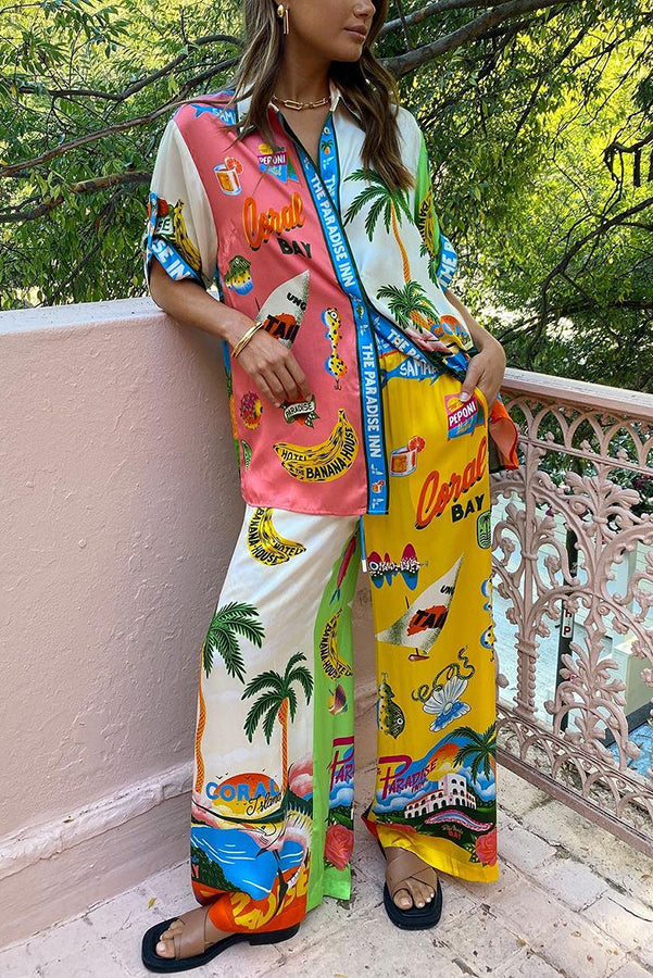 Kissed By The Sun – Übergroße Satinbluse mit einzigartigem Farbblock-Print und Knopfleiste