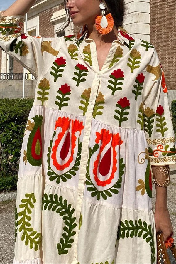 Resort-Maxikleid mit botanischem Print, Revers und Rüschen