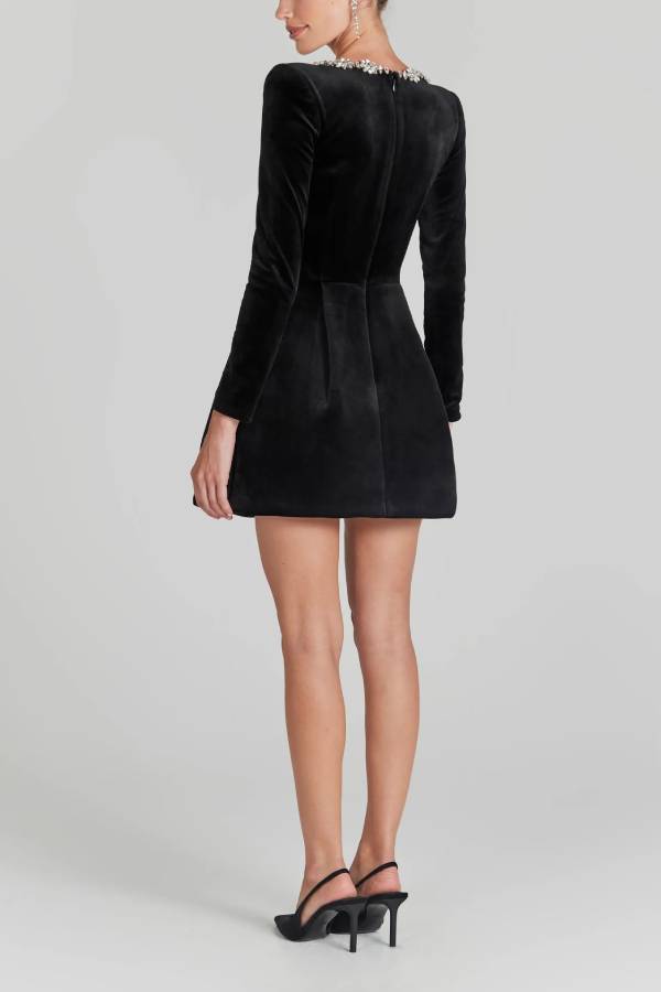 Minirock mit Schmucksteinbesatz, quadratischem Ausschnitt und gepolsterten Schultern