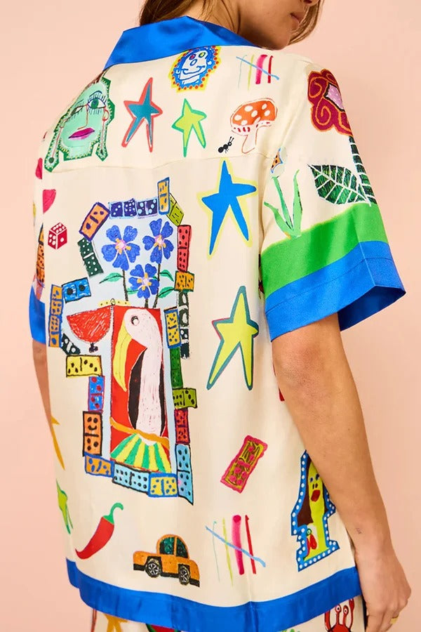 Lebendige Strand-Satin-Übergröße-Bluse mit einzigartigem Druck und Colorblock-Besatz