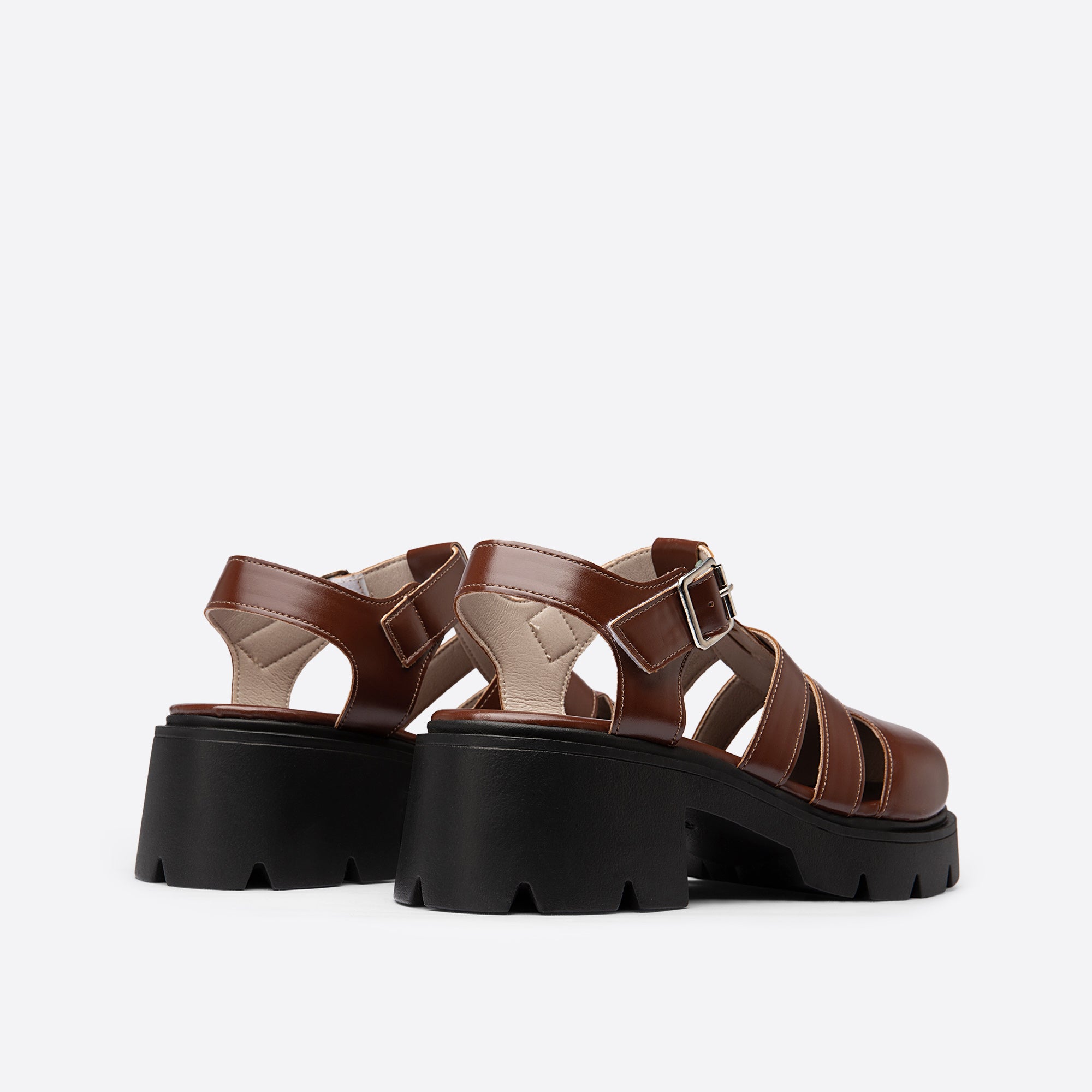 Fischer-Plateausandalen aus Leder