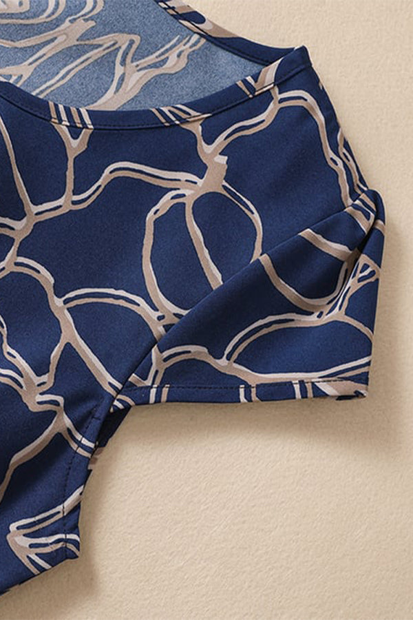 Mittellanges Kleid mit Rundhalsausschnitt und Bindegürtel aus Baumwolle und Leinen mit Print