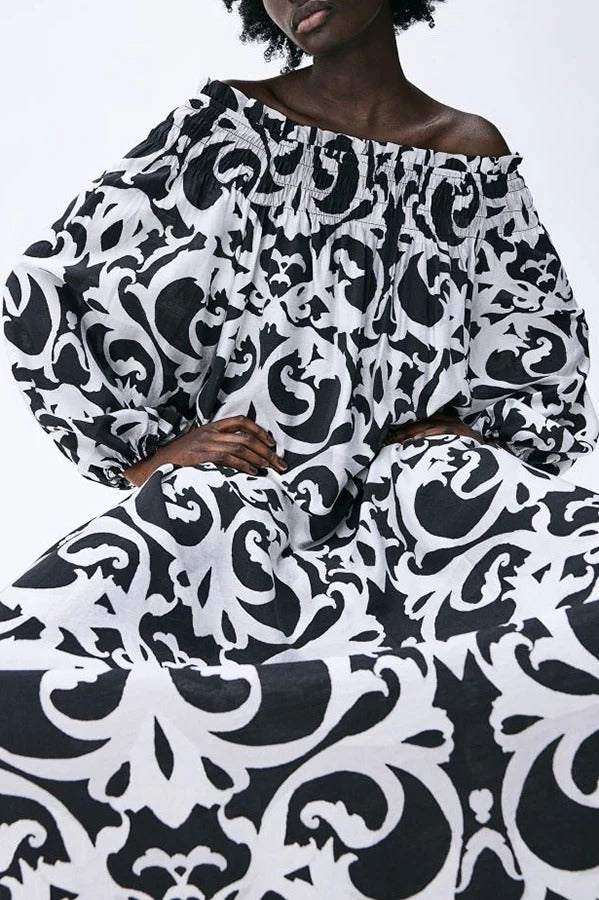 Chrissa – Lockeres Maxikleid mit einzigartigem Druck, elastischem Schulterfrei und Ballonärmeln