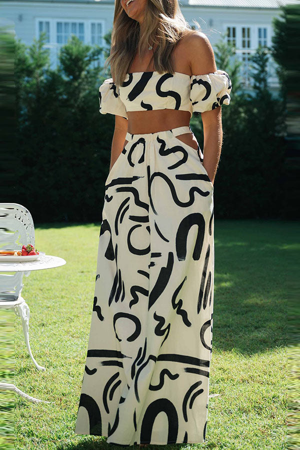Allegra Set mit schulterfreiem Crop-Top mit Doodle-Print und Maxirock mit Taschen und Cut-outs