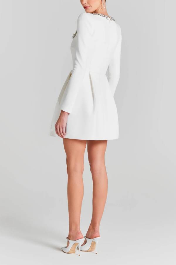 Minirock mit Schmucksteinbesatz, quadratischem Ausschnitt und gepolsterten Schultern