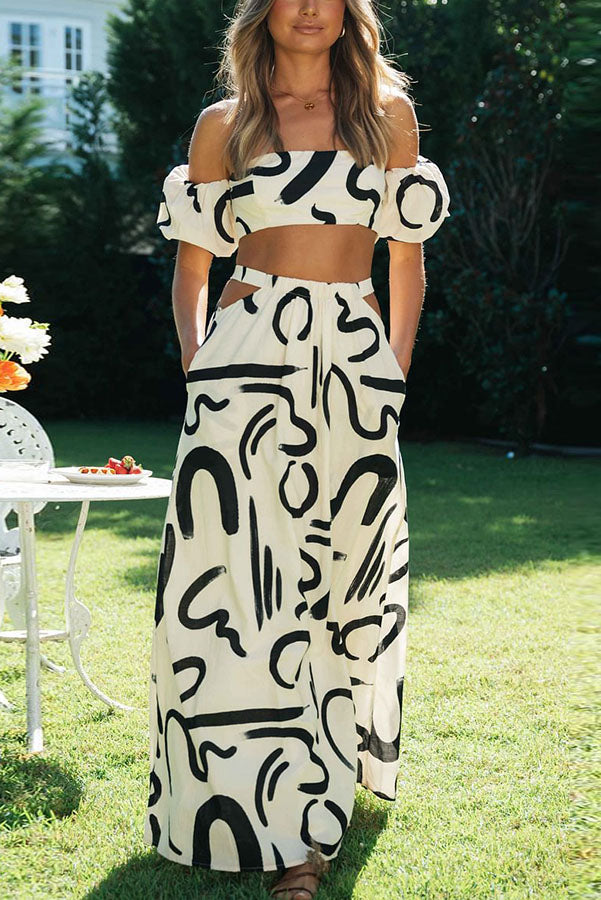 Allegra Set mit schulterfreiem Crop-Top mit Doodle-Print und Maxirock mit Taschen und Cut-outs
