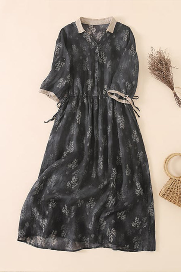 Kleid mit V-Ausschnitt und Blumenmuster in Kontrastfarbe aus Baumwolle und Leinen