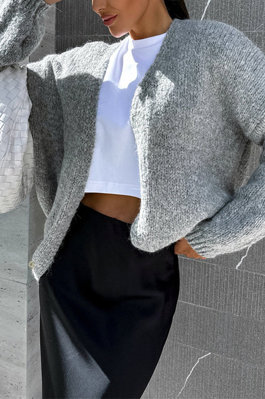 Einfarbige, lässige Strickjacke mit langen Ärmeln