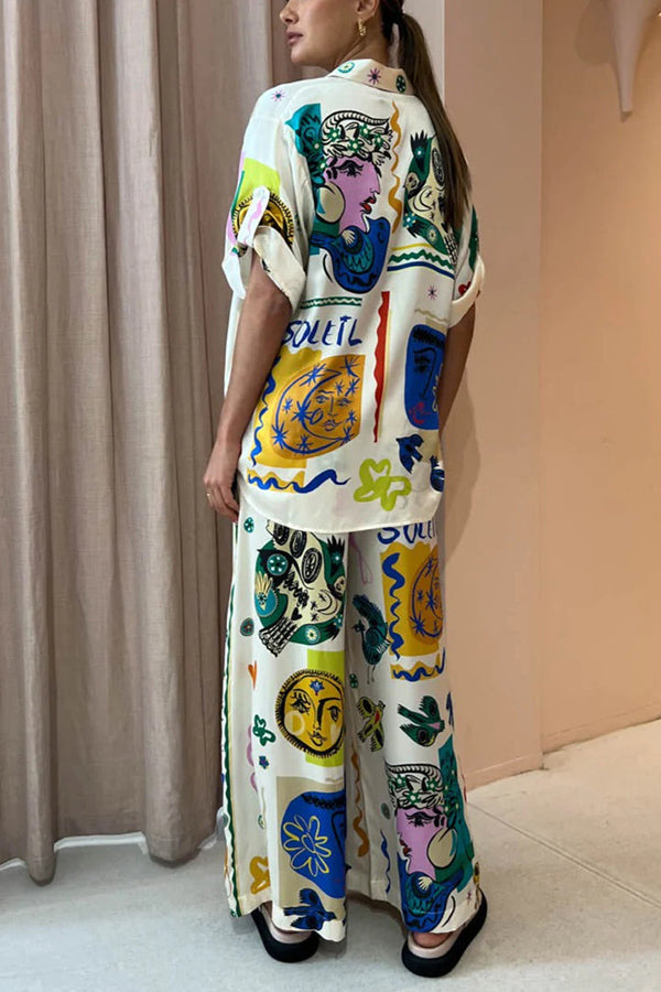 Pantalon large à taille élastique et poches Meralda à imprimé unique