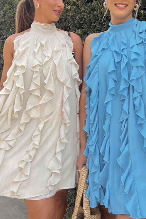 Mini-robe trapèze plissée en mousseline à col haut et volants