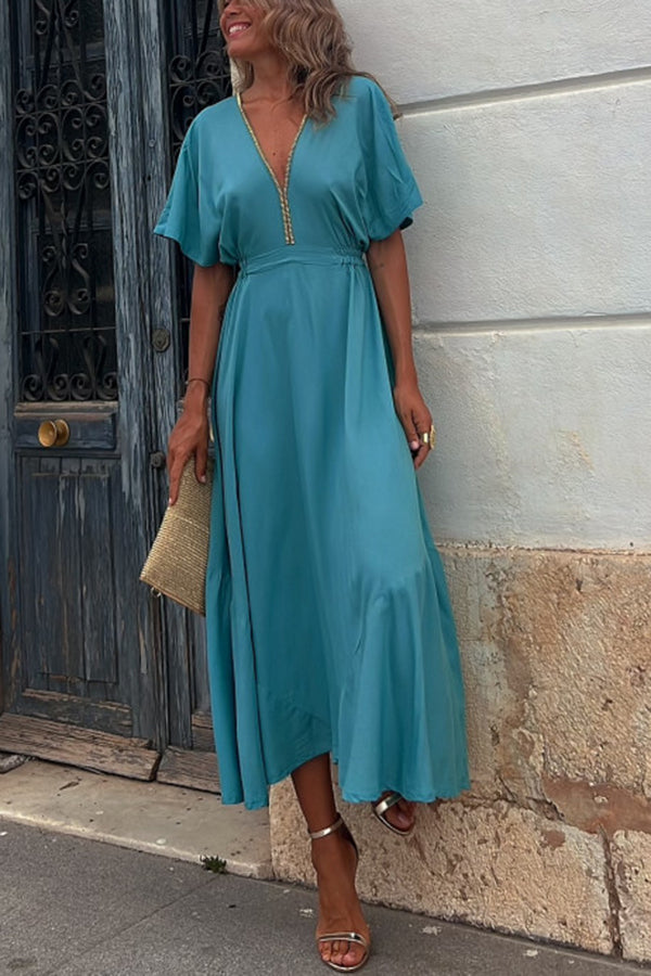 Robe mi-longue classique à taille élastique et bordure dorée