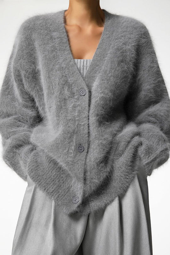 Einfarbige, lockere Strickjacke mit V-Ausschnitt und langen Ärmeln
