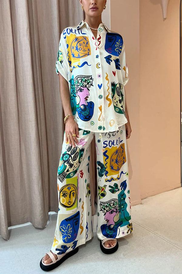 Pantalon large à taille élastique et poches Meralda à imprimé unique