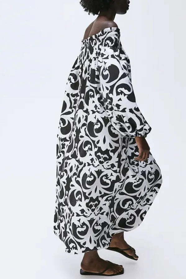 Chrissa – Lockeres Maxikleid mit einzigartigem Druck, elastischem Schulterfrei und Ballonärmeln