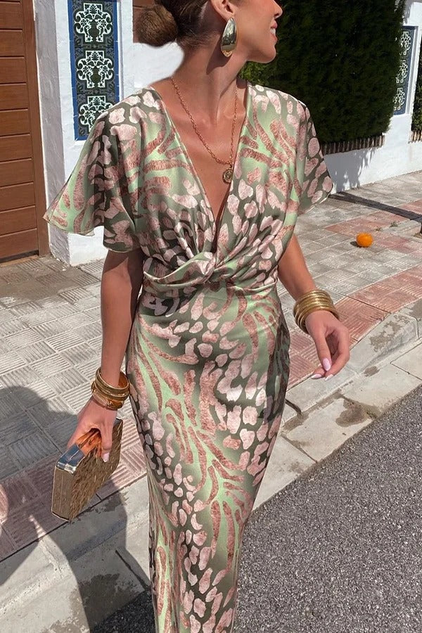 Einzigartiges bedrucktes, kurzärmliges Maxikleid mit V-Ausschnitt und Knotendetail in schmaler Passform