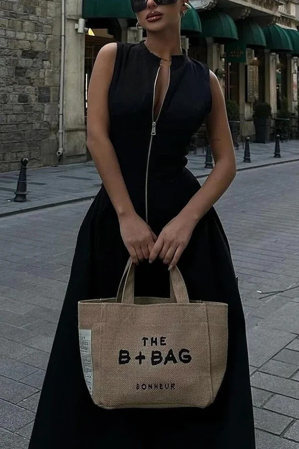 Robe longue élégante sans manches à col en V et fermeture éclair