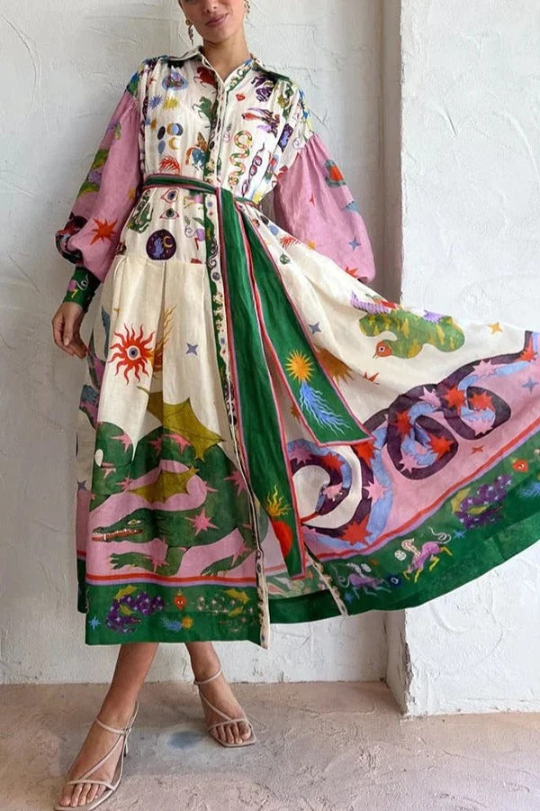 MÜHELOSES UND VERSPIELTES MIDIKLEID MIT EINZIGARTIGEM PRINT UND BALLONÄRMELN