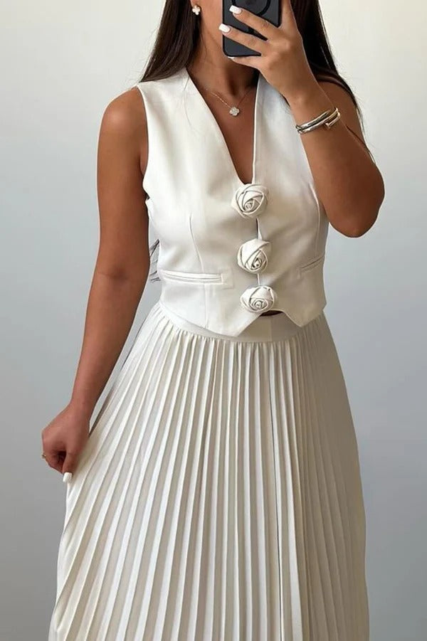 Stilvolles Set aus ärmellosem Tanktop und plissiertem Maxirock mit Rosette-Muster