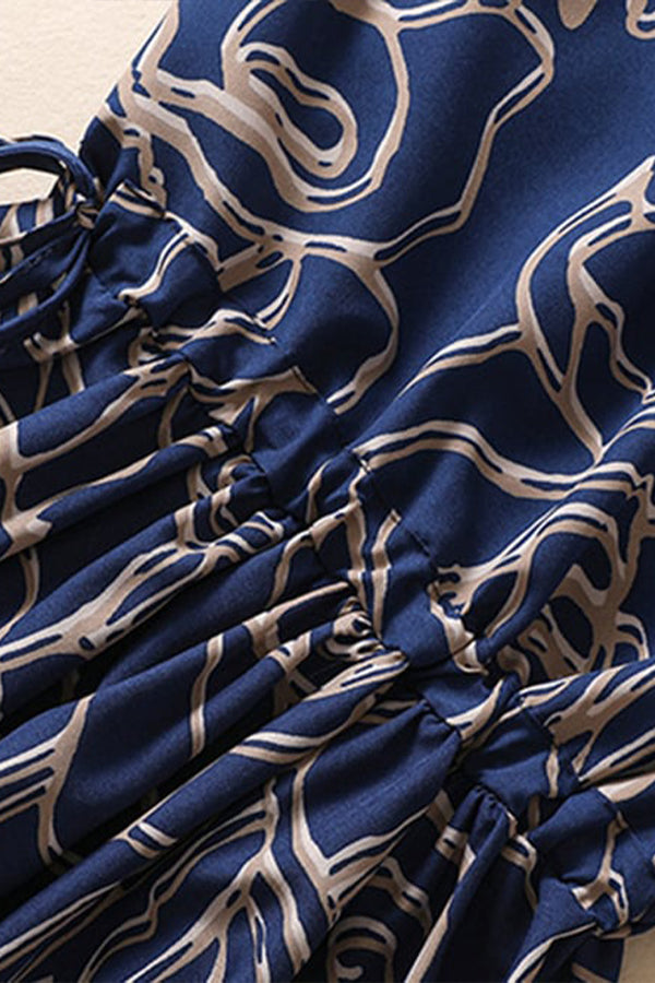 Mittellanges Kleid mit Rundhalsausschnitt und Bindegürtel aus Baumwolle und Leinen mit Print