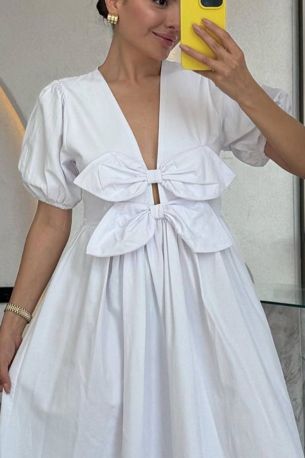 Devon Maxikleid mit doppelter Schleife vorne und Puffärmeln und Taschen