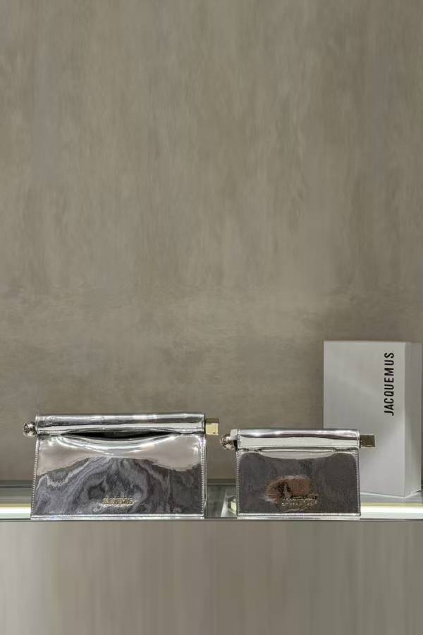 Mini clutch bag with metallic hardware