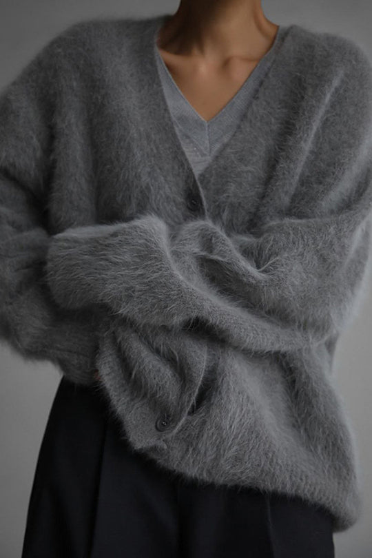 Einfarbige, lockere Strickjacke mit V-Ausschnitt und langen Ärmeln