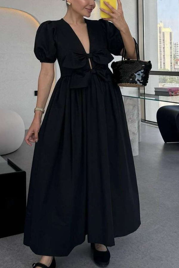 Devon Maxikleid mit doppelter Schleife vorne und Puffärmeln und Taschen