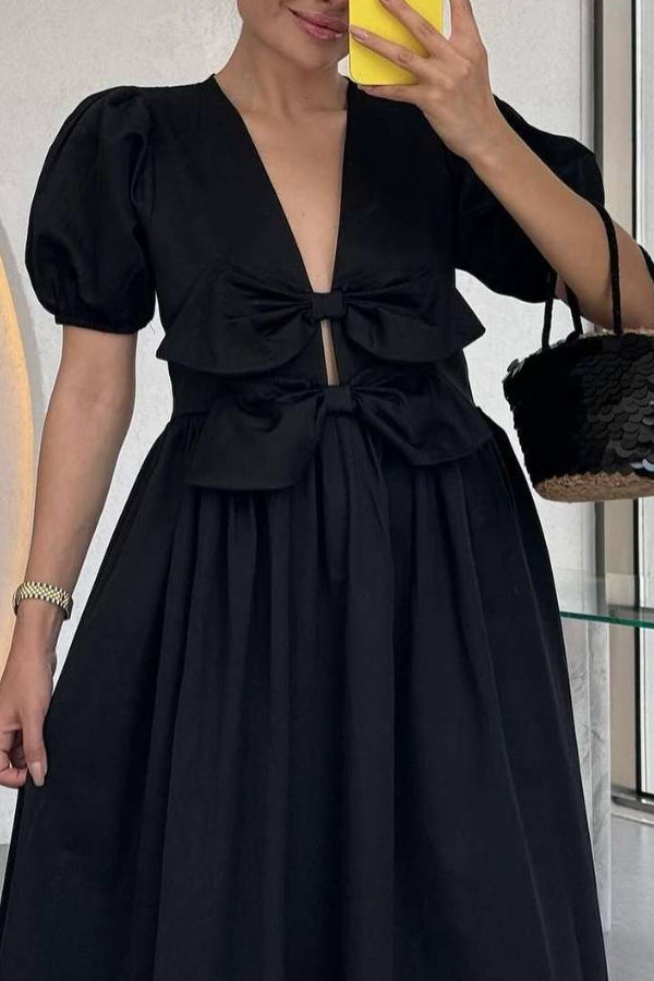 Devon Maxikleid mit doppelter Schleife vorne und Puffärmeln und Taschen