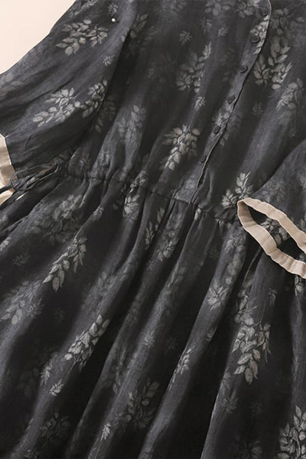 Kleid mit V-Ausschnitt und Blumenmuster in Kontrastfarbe aus Baumwolle und Leinen