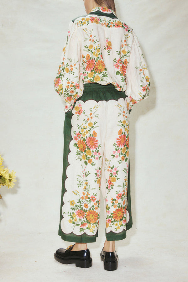 PANTALON LARGE À POCHES ET TAILLE ÉLASTIQUE À FLEURS SYMÉTRIQUES RUISA