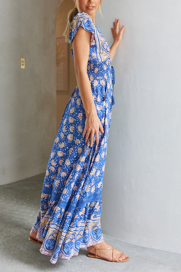 Blaues Tunikakleid mit Kamelien-Print