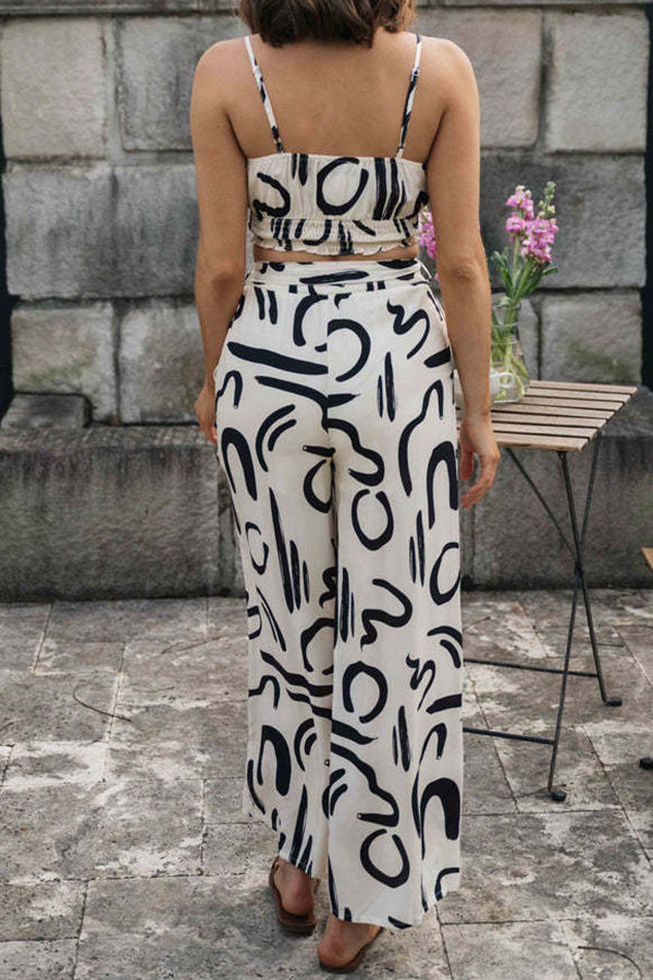 Set aus Camisole-Oberteil mit Doodle-Print und Hose mit weitem Bein und geknoteter Tasche