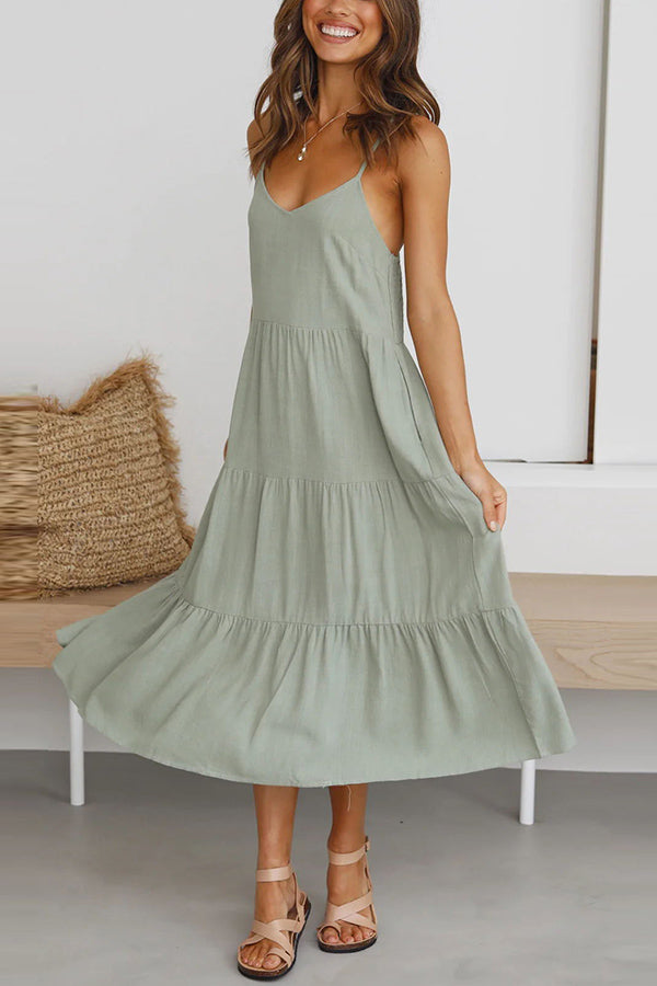 Robe mi-longue smockée en lin mélangé avec poches dans le dos