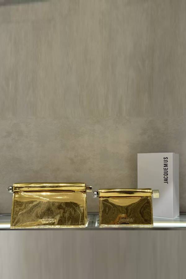 Mini clutch bag with metallic hardware